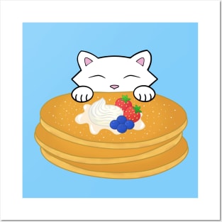 Cat eating pancakes with cream Posters and Art